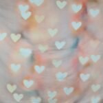 Romantikus, szív alakú bokeh fényekkel díszített fotóautomata háttér pasztell színekkel